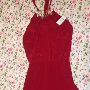 Cache Romper retails for $228. Brand new.